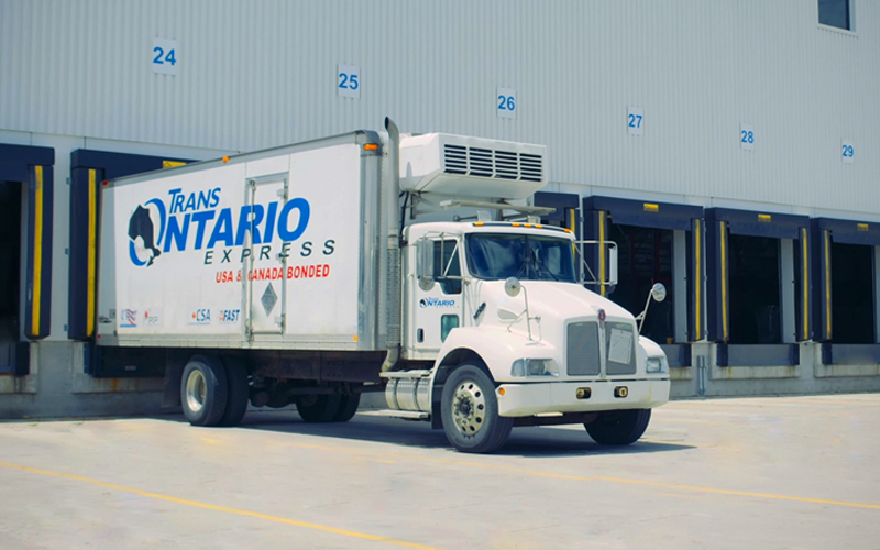 Trans Ontario's truck loading freight Dock to Dock in Trans Ontario's warehouse ready for LTL shipping
