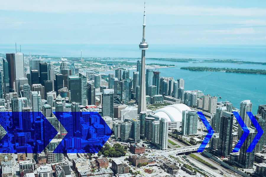 toronto mid aerial shot with CN tower with Trans Ontario blue arrows